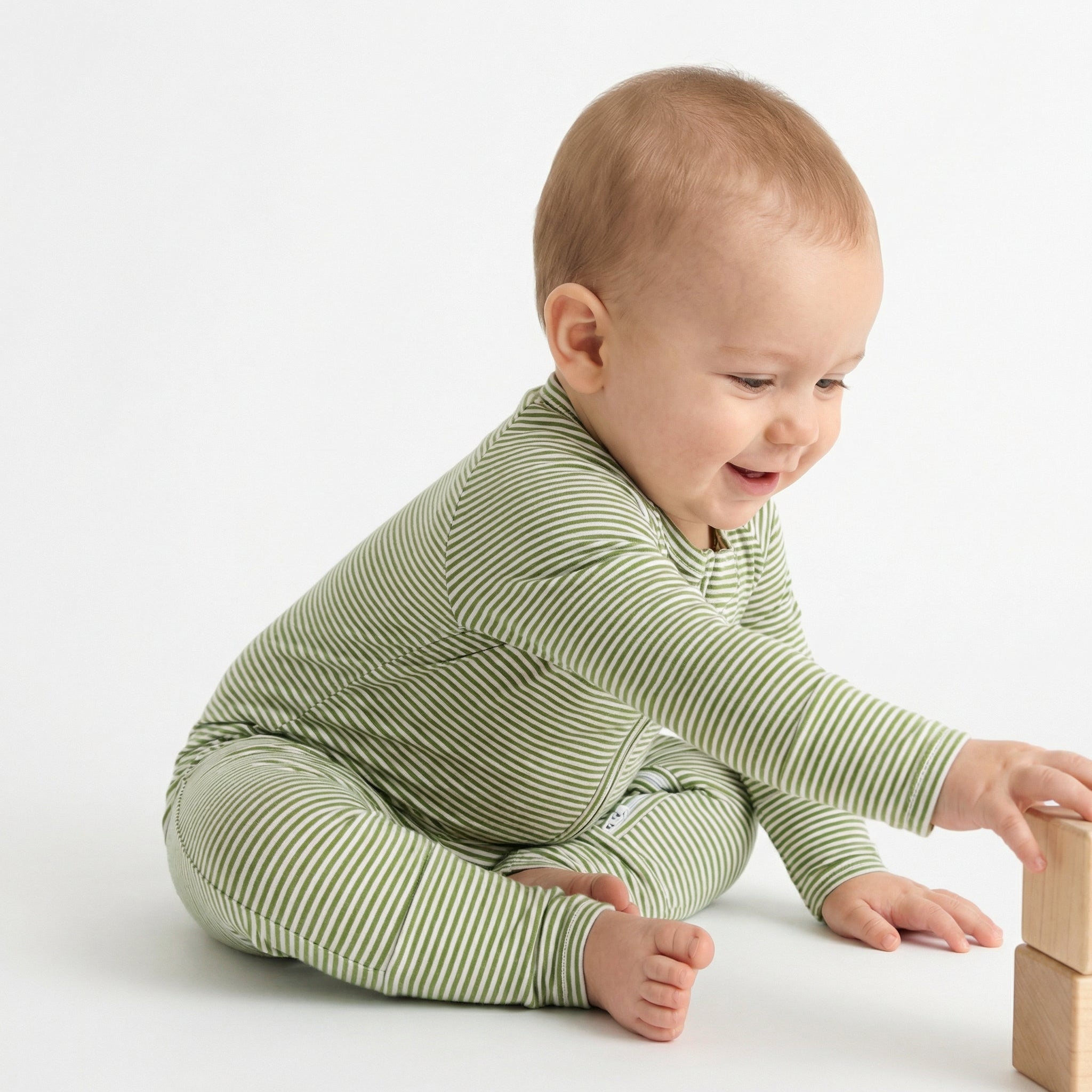 Best lightweight baby sleeper in green and white stripe for year round use recommended by modern parents