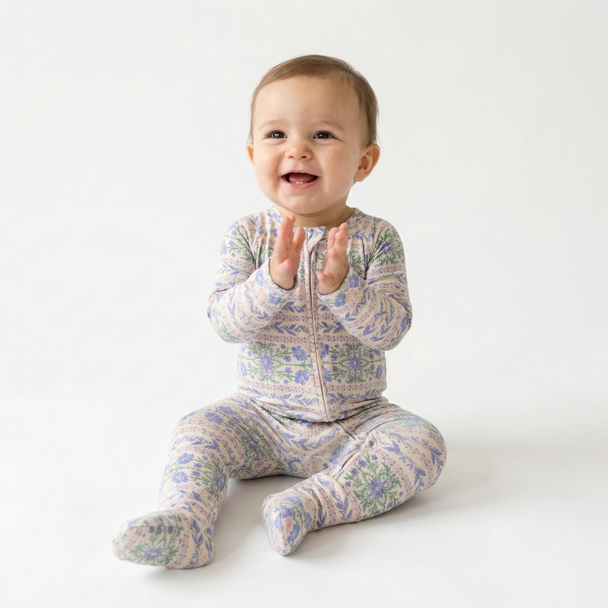 Top ranked breathable bamboo baby sleeper in purple floral loved by parents of newborns with sensitive skin