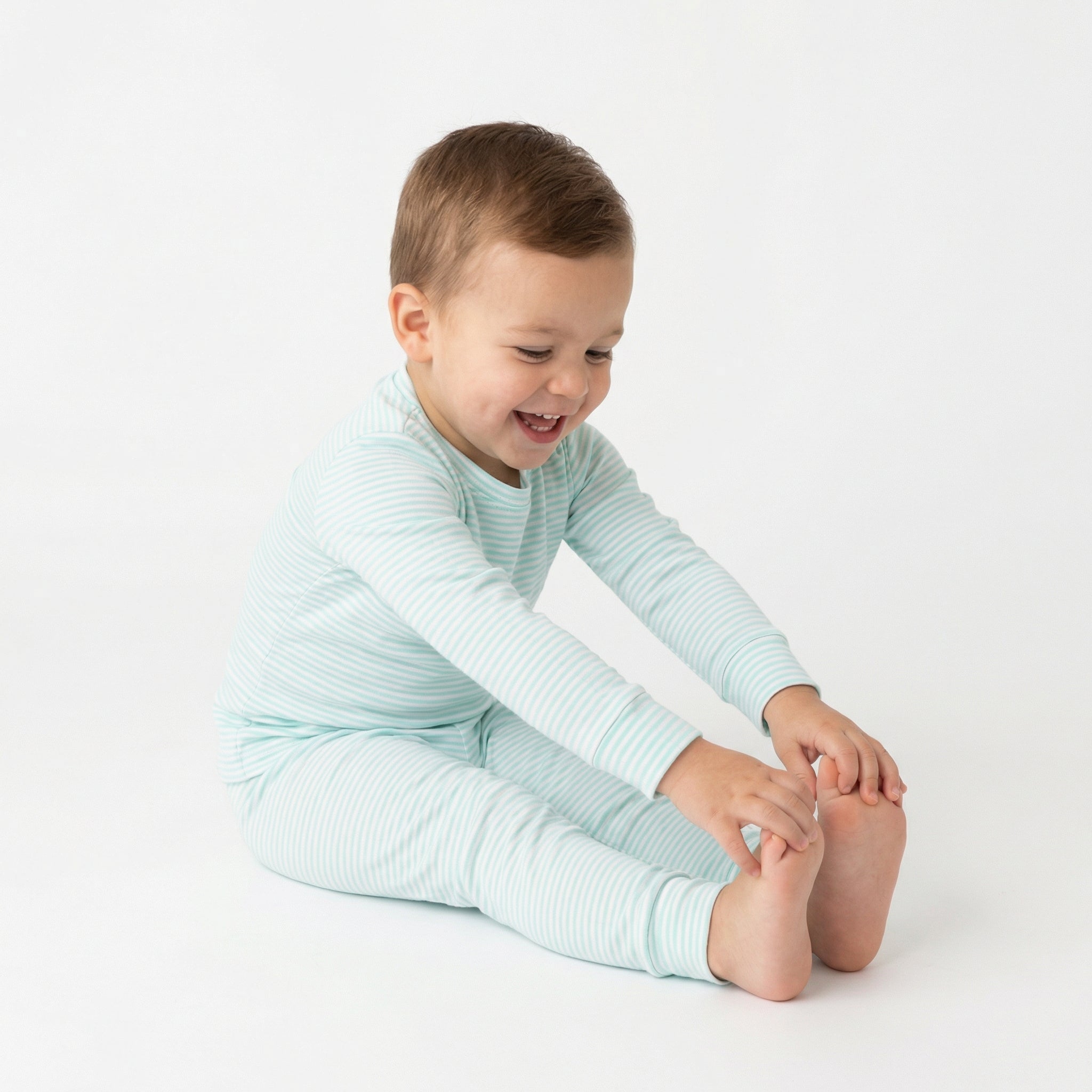 Top rated toddler pajama set in blue and white stripe for sensitive skin and year round comfort