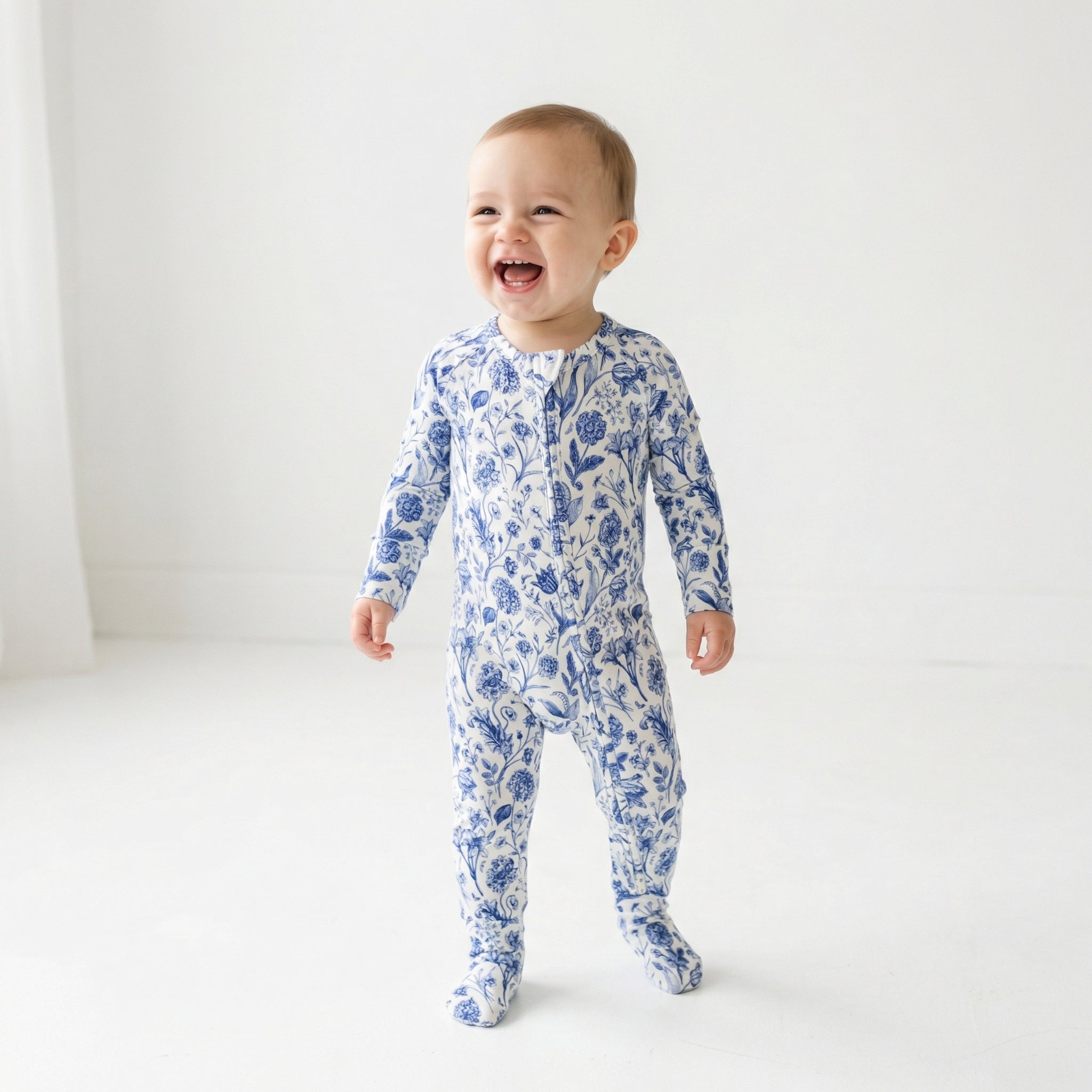 Top ranked breathable bamboo baby sleeper in blue floral loved by parents of newborns with sensitive skin