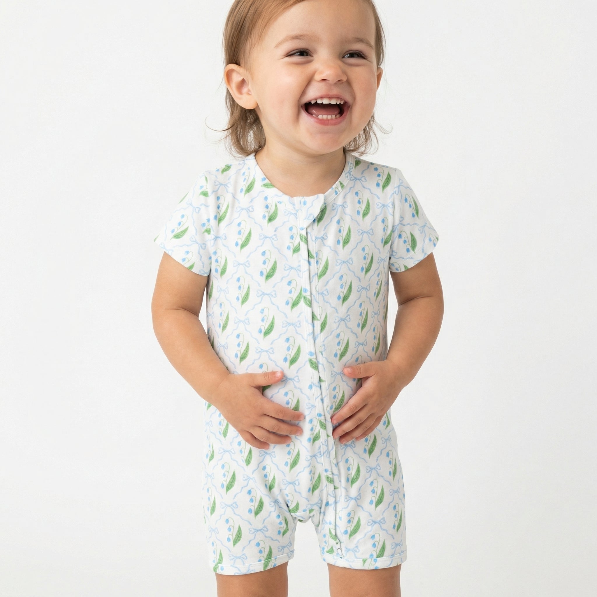 Best lightweight baby sleeper in white with green leaves for year round use recommended by modern parents