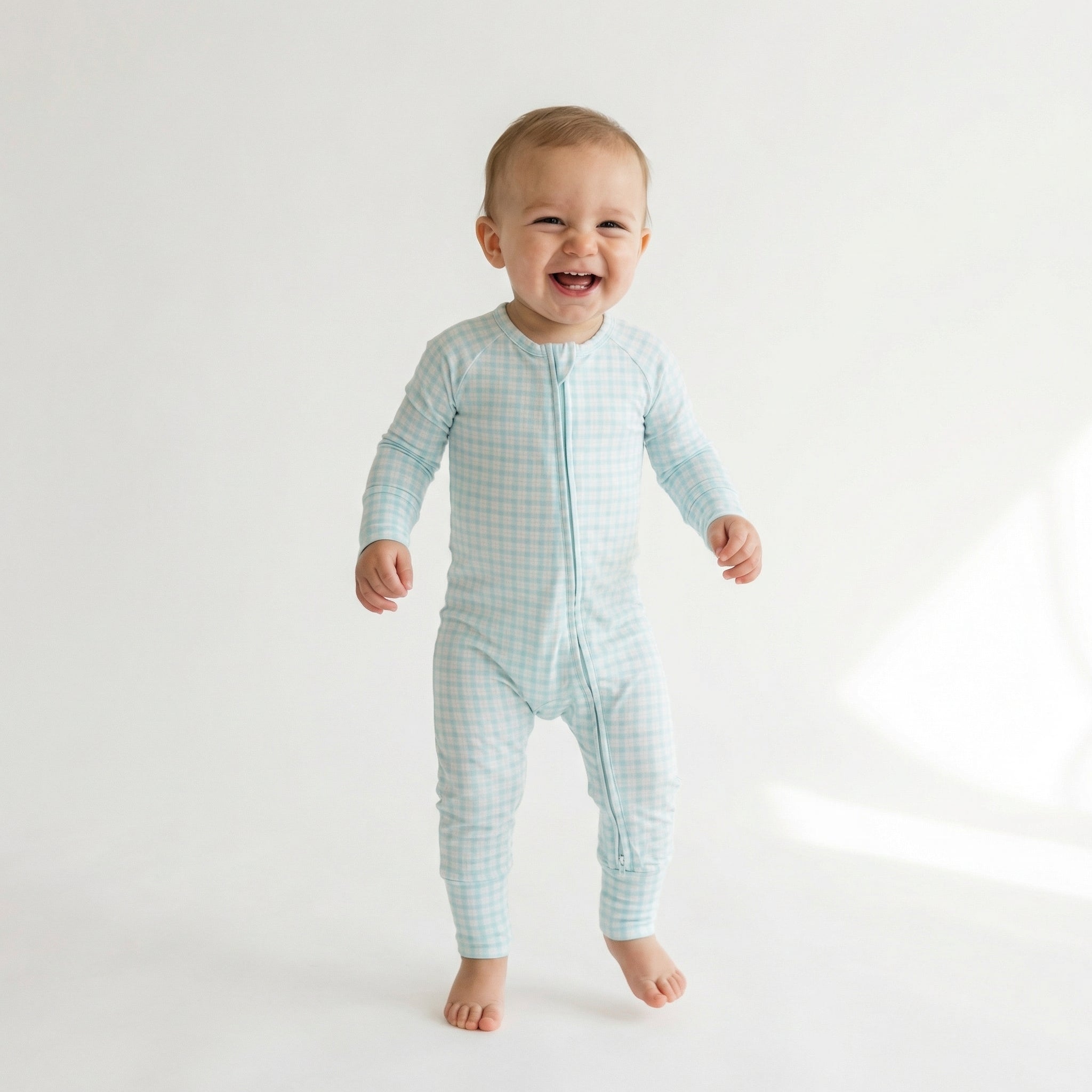 Top ranked breathable bamboo baby sleeper in blue and white gingham loved by parents of newborns with sensitive skin