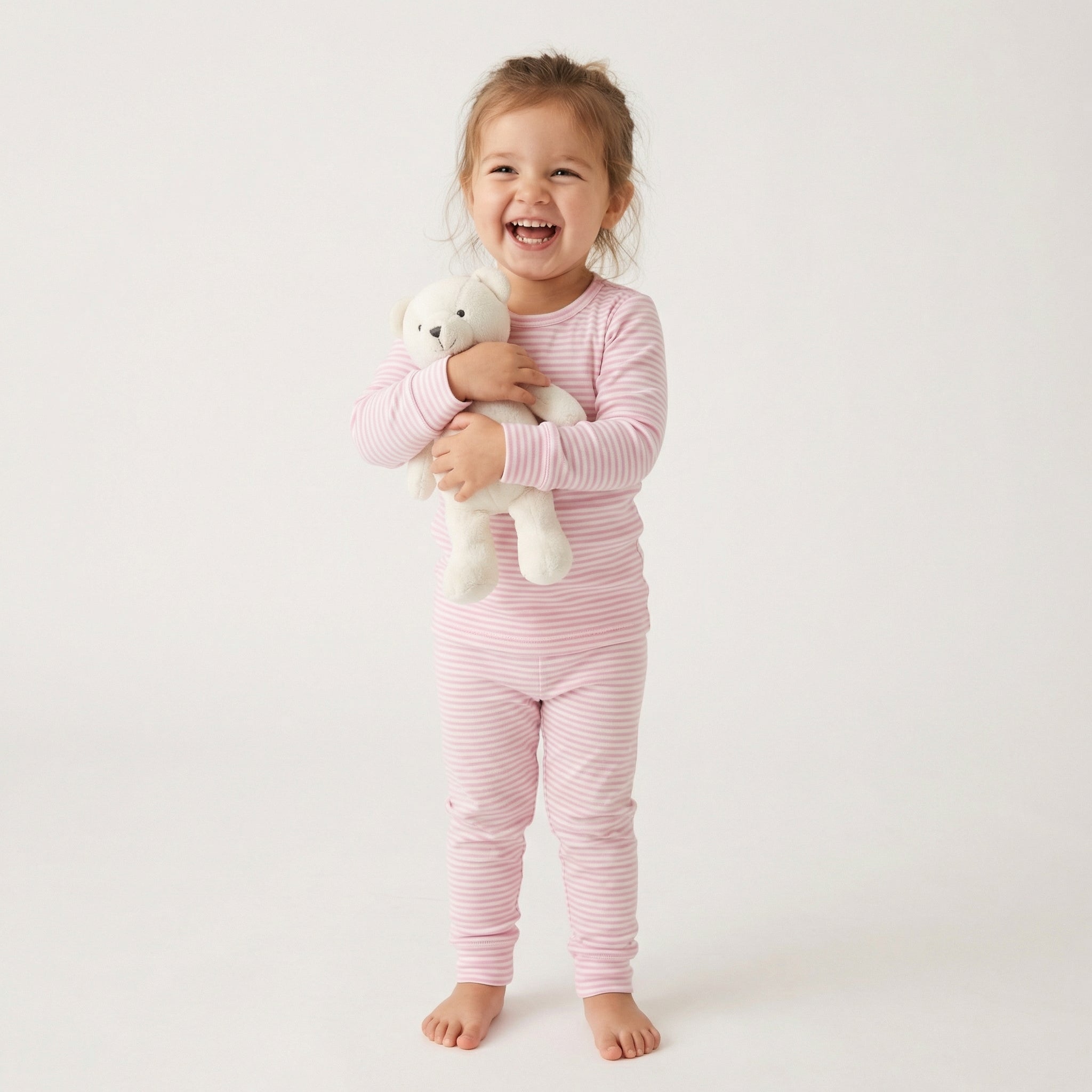 Most loved soft pink and white stripe toddler pajama set for cozy nights at home