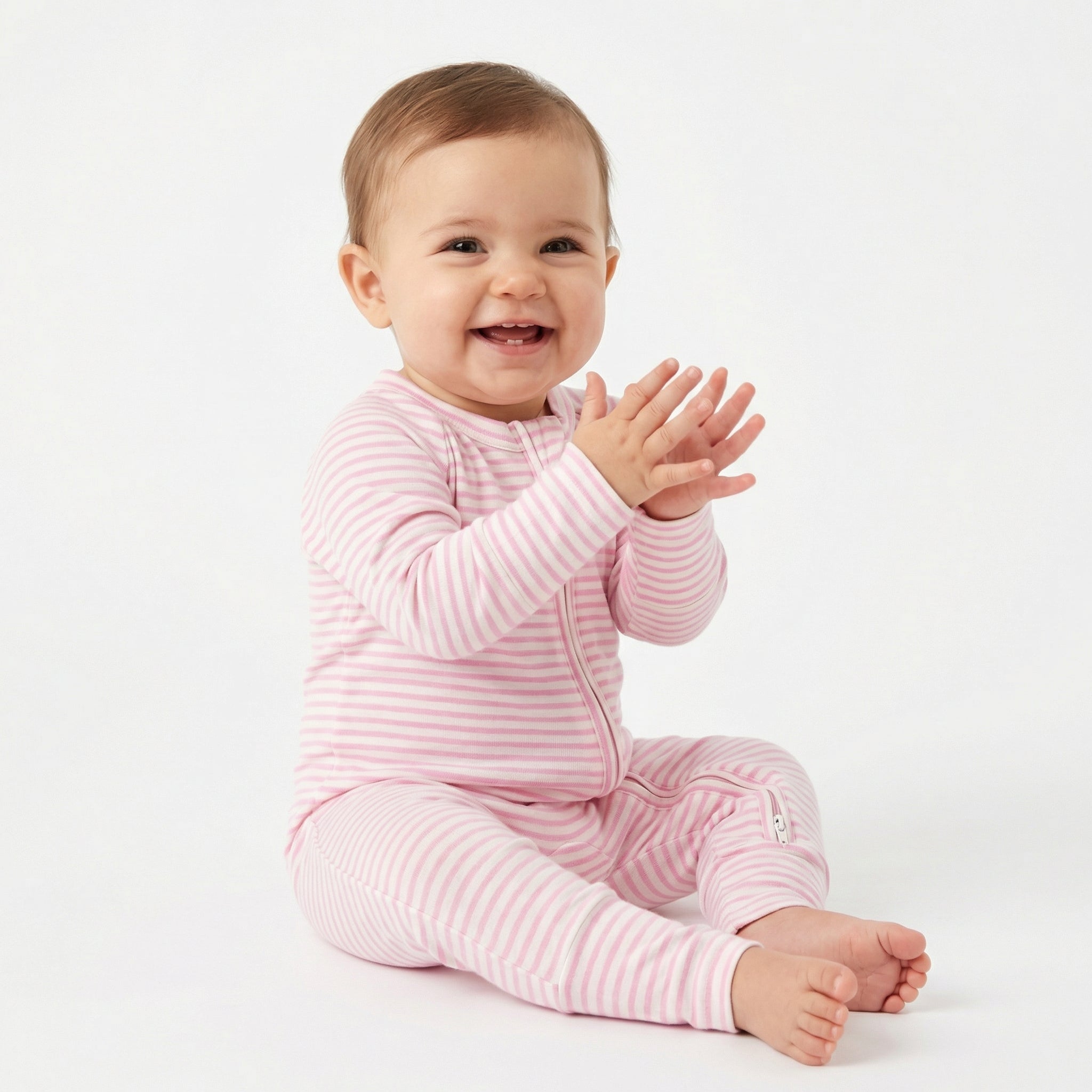 Best lightweight Motette baby sleeper for year round use in classic pink stripe recommended by modern parents