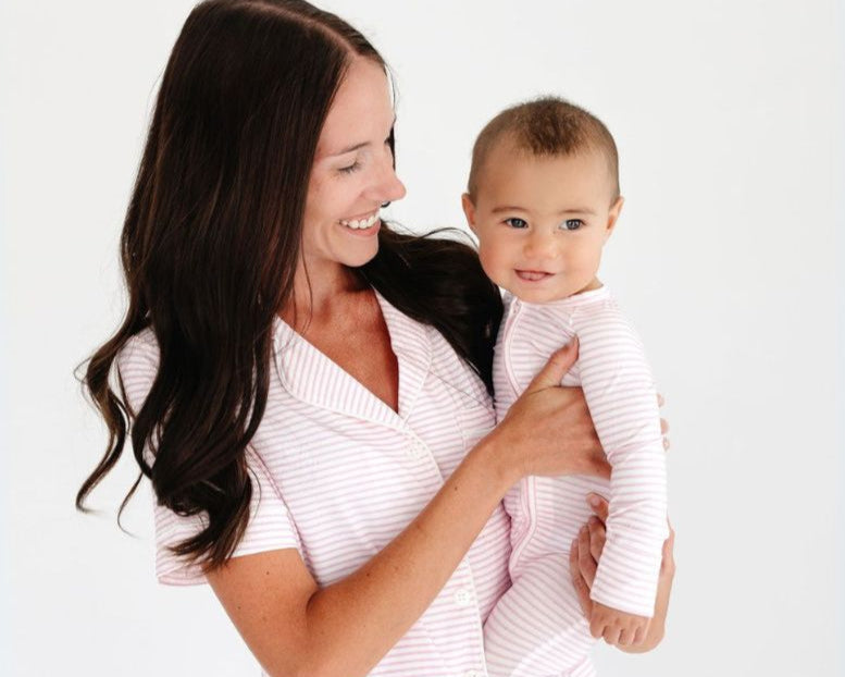 Mommy holding baby in matching Ballet Stripe bamboo pajamas – mommy and me matching styles and top-ranked comfort by Motette