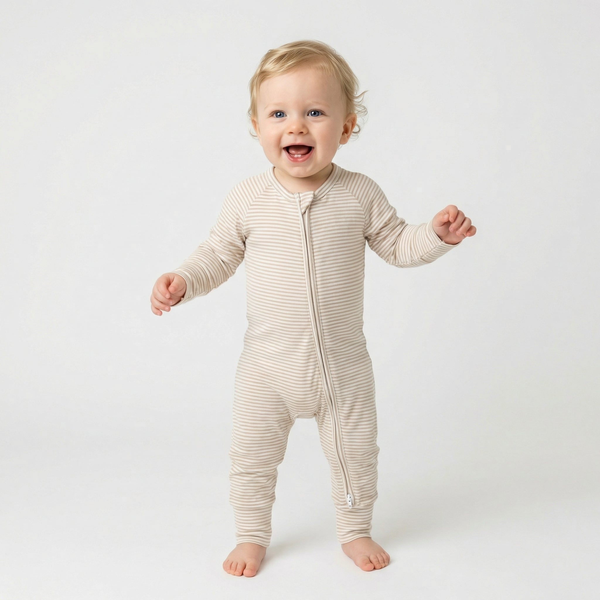 Editor favorite Motette organic bamboo baby sleeper in brown and white stripe designed for everyday comfort