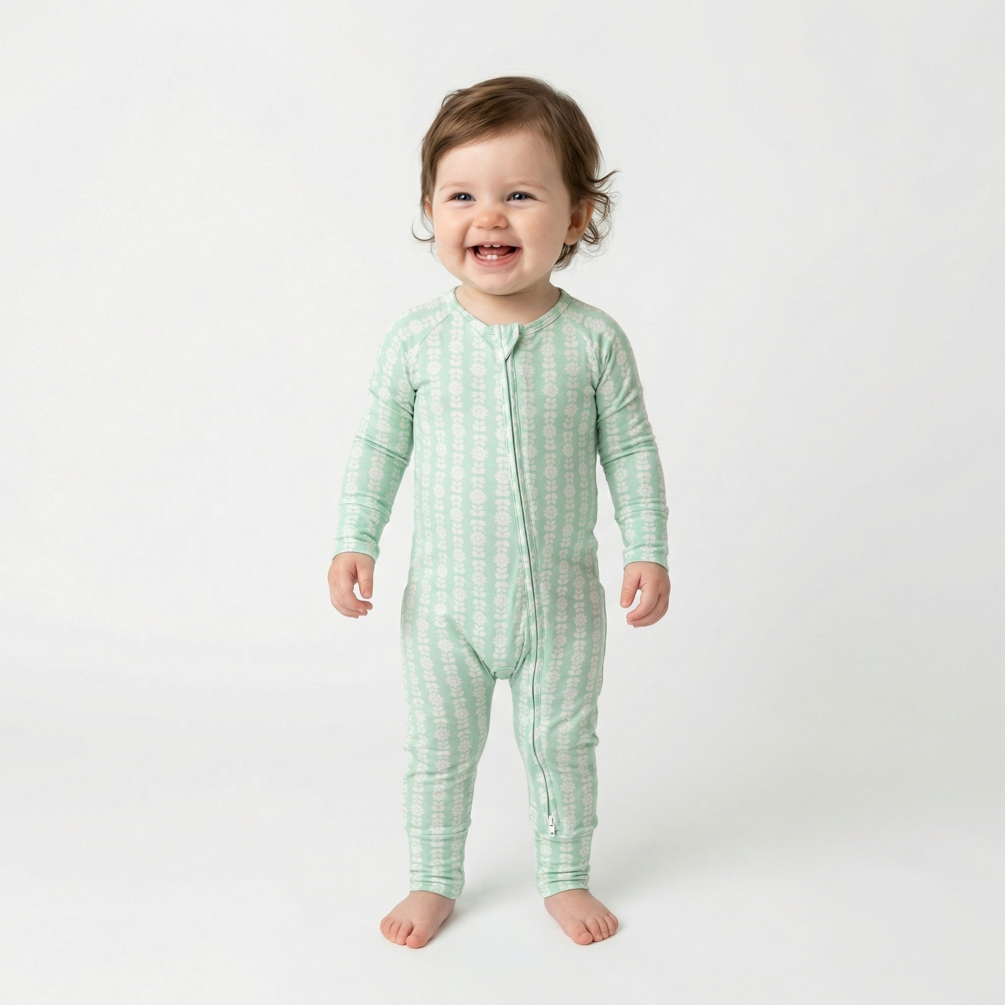 Best lightweight baby sleeper in green with white floral for year round use recommended by modern parents