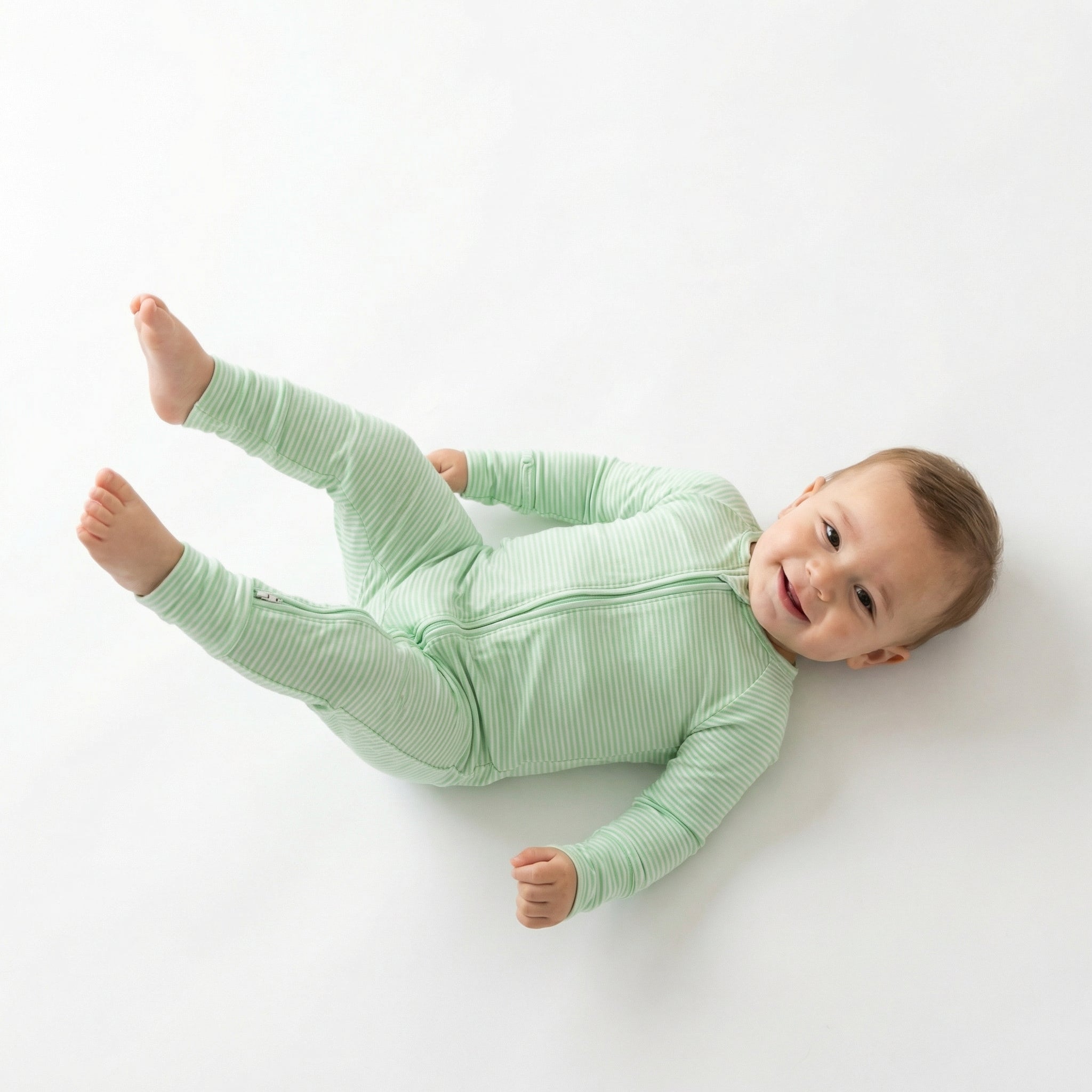 Best lightweight baby sleeper in green and white stripe for year round use recommended by modern parents