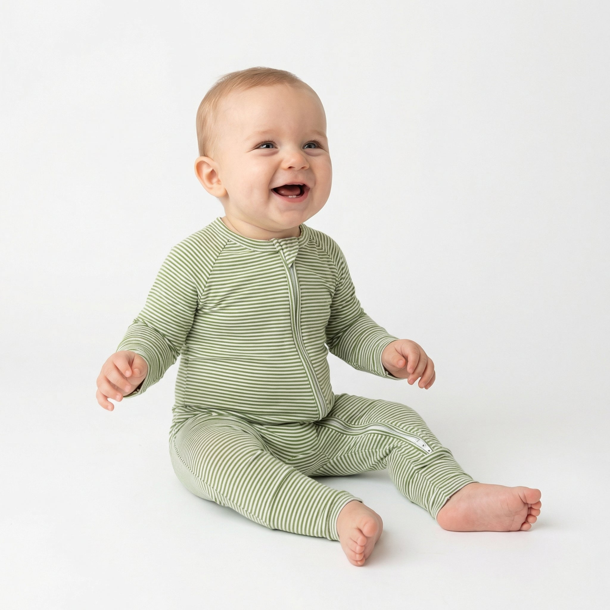 Top ranked breathable bamboo baby sleeper in green and white stripe loved by parents of newborns with sensitive skin