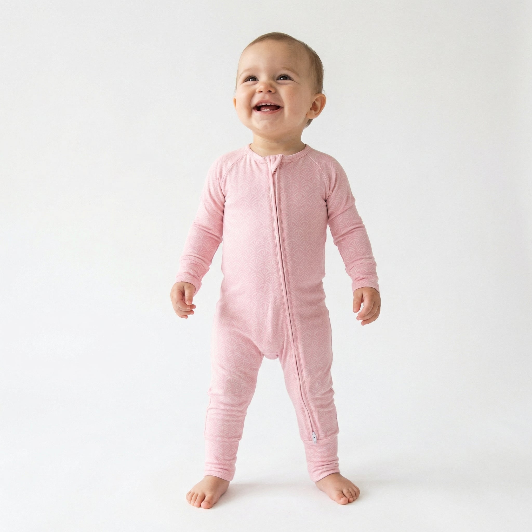 Top ranked breathable bamboo baby sleeper in pink loved by parents of newborns with sensitive skin