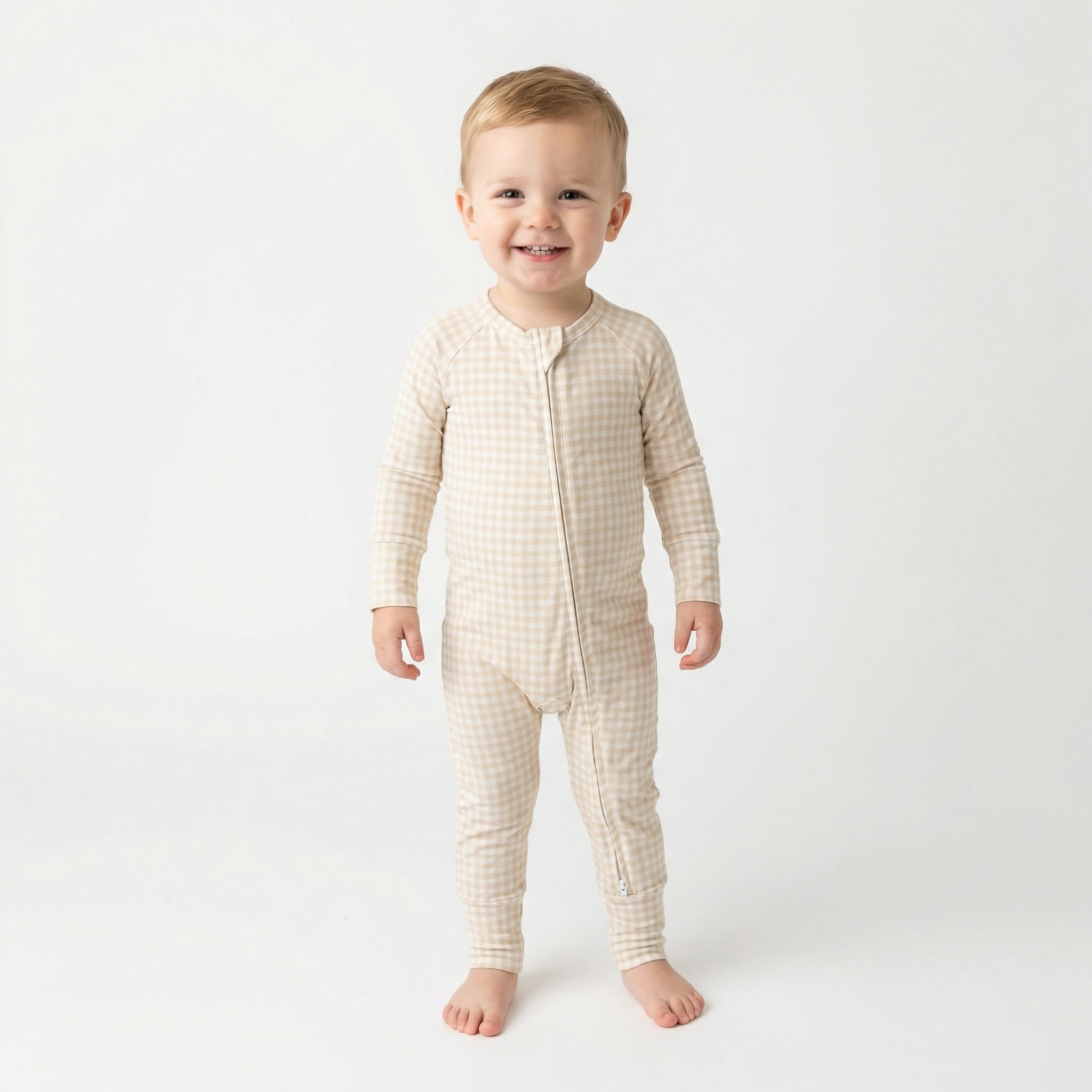 Editor favorite Motette organic bamboo baby sleeper in brown gingham designed for everyday comfort