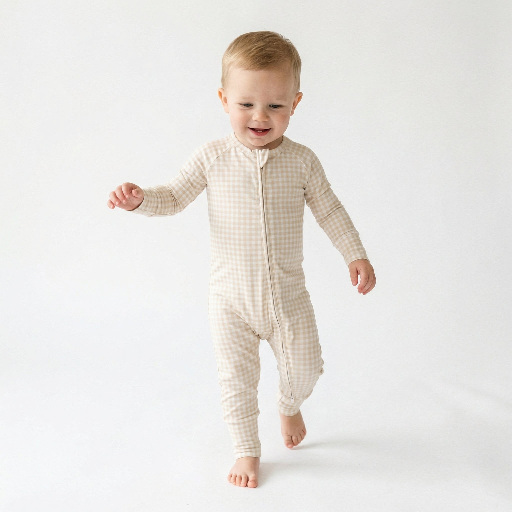 Best lightweight baby sleeper in brown gingham for year round use recommended by modern parents