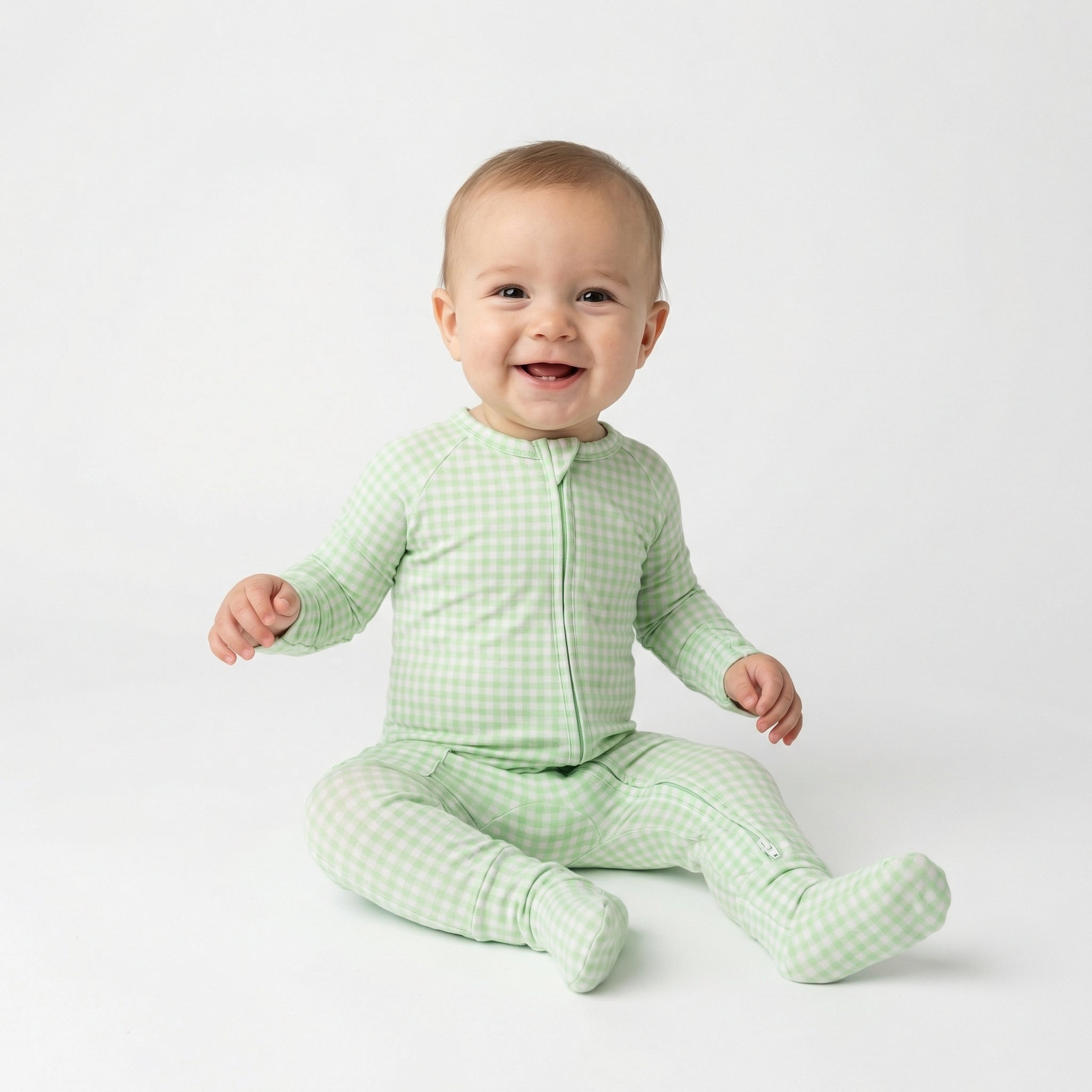 Best lightweight baby sleeper in green gingham for year round use recommended by modern parents