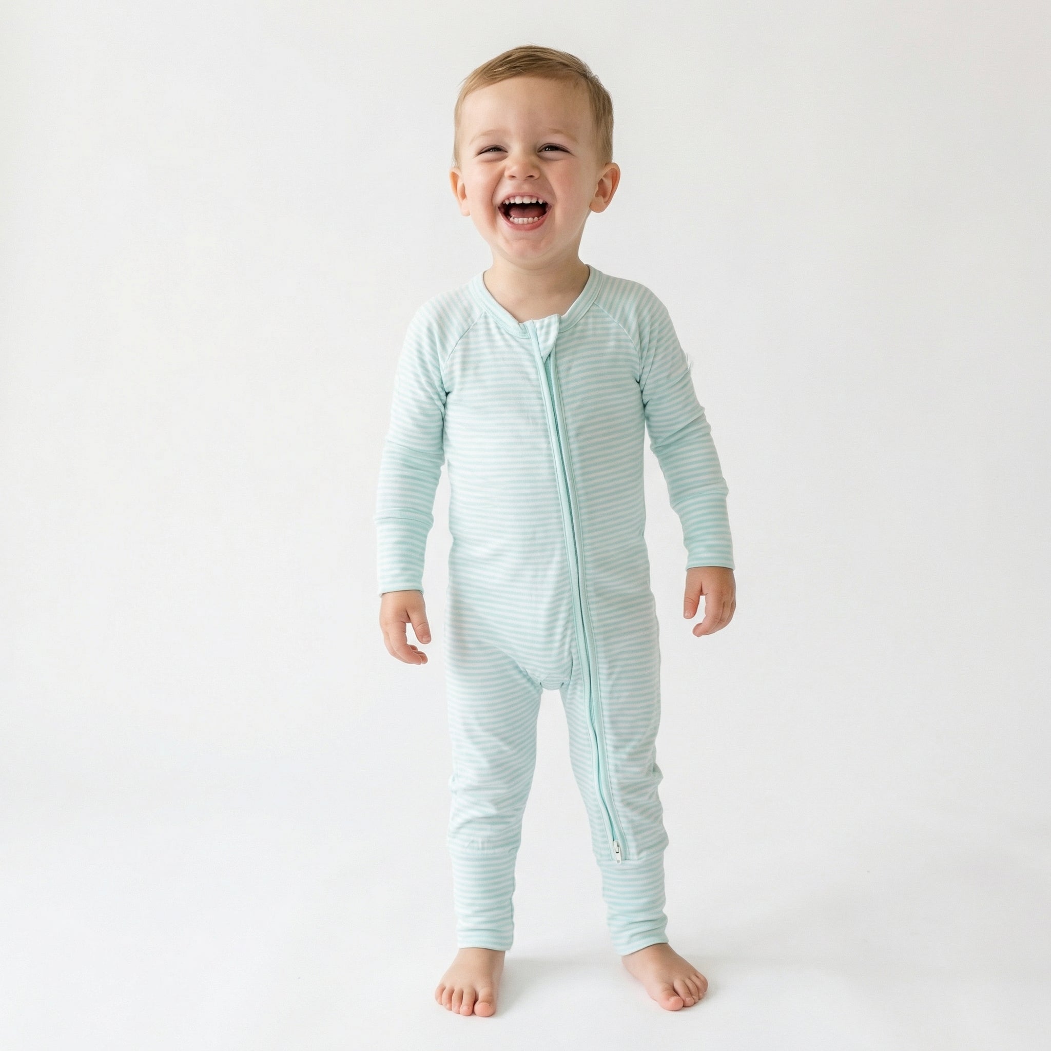 Editor favorite Motette organic bamboo baby sleeper in blue and white stripe designed for everyday comfort