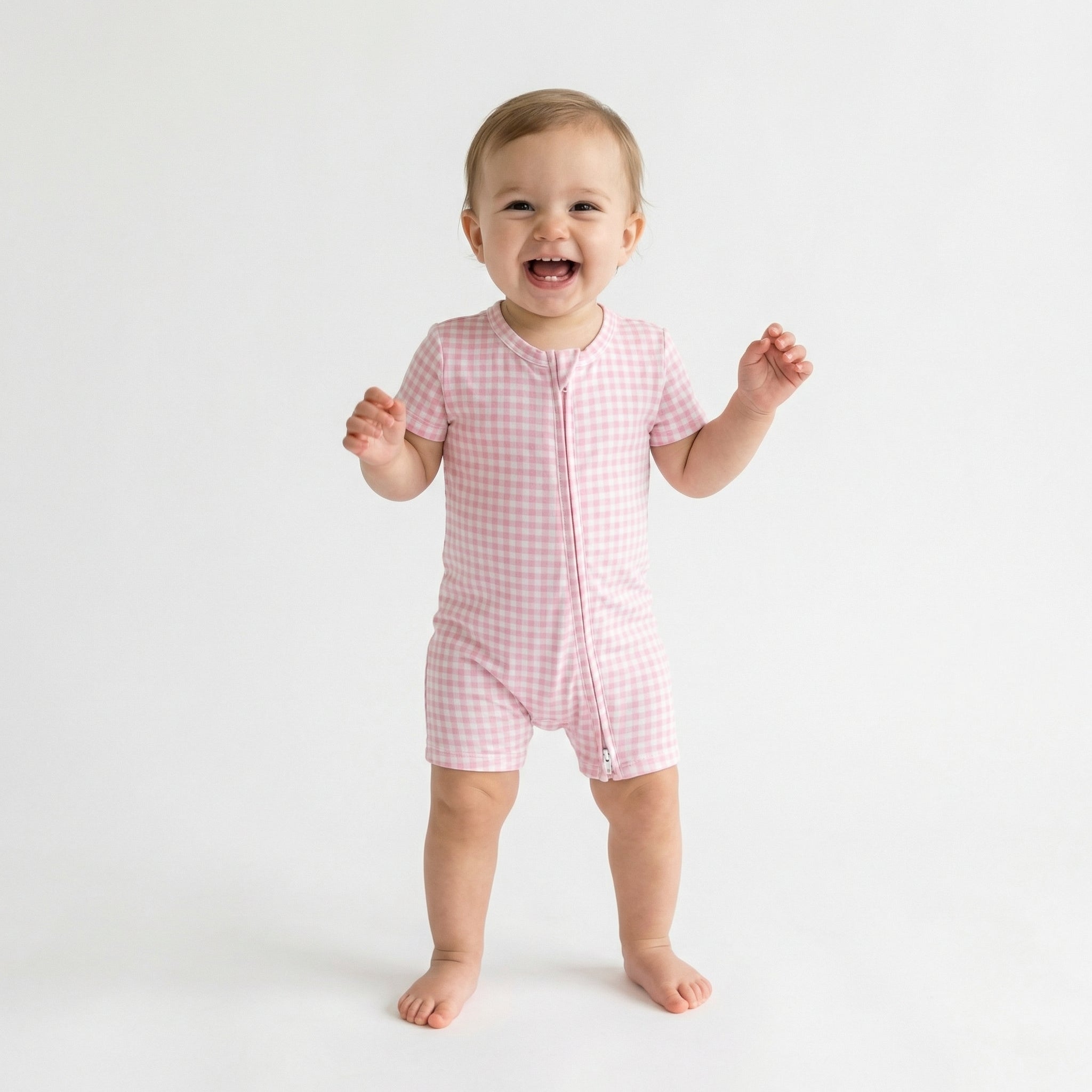 Best lightweight baby sleeper in pink gingham for year round use recommended by modern parents