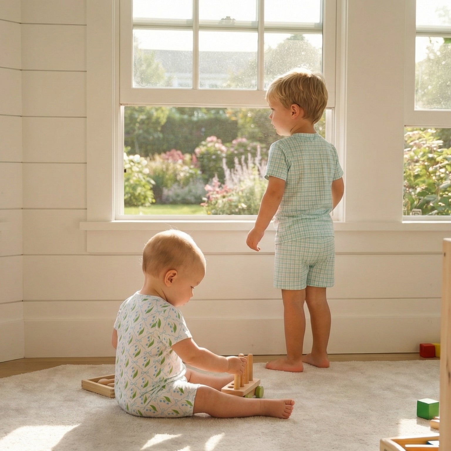 Consumer favorite Motette kids pajama set in blue and green gingham for bedtime routines