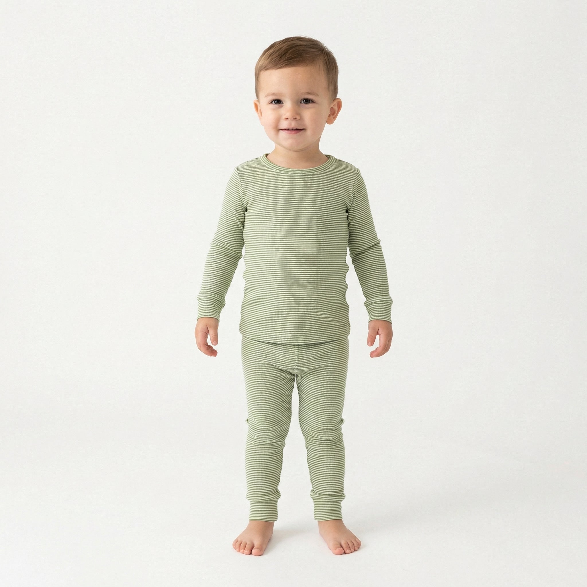 Editor loved Motette breathable green and white stripe toddler sleepwear for warm sleepers