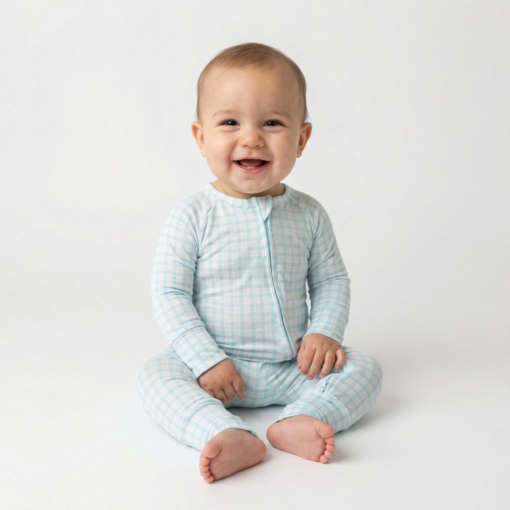 Best lightweight baby sleeper in blue and white gingham for year round use recommended by modern parents