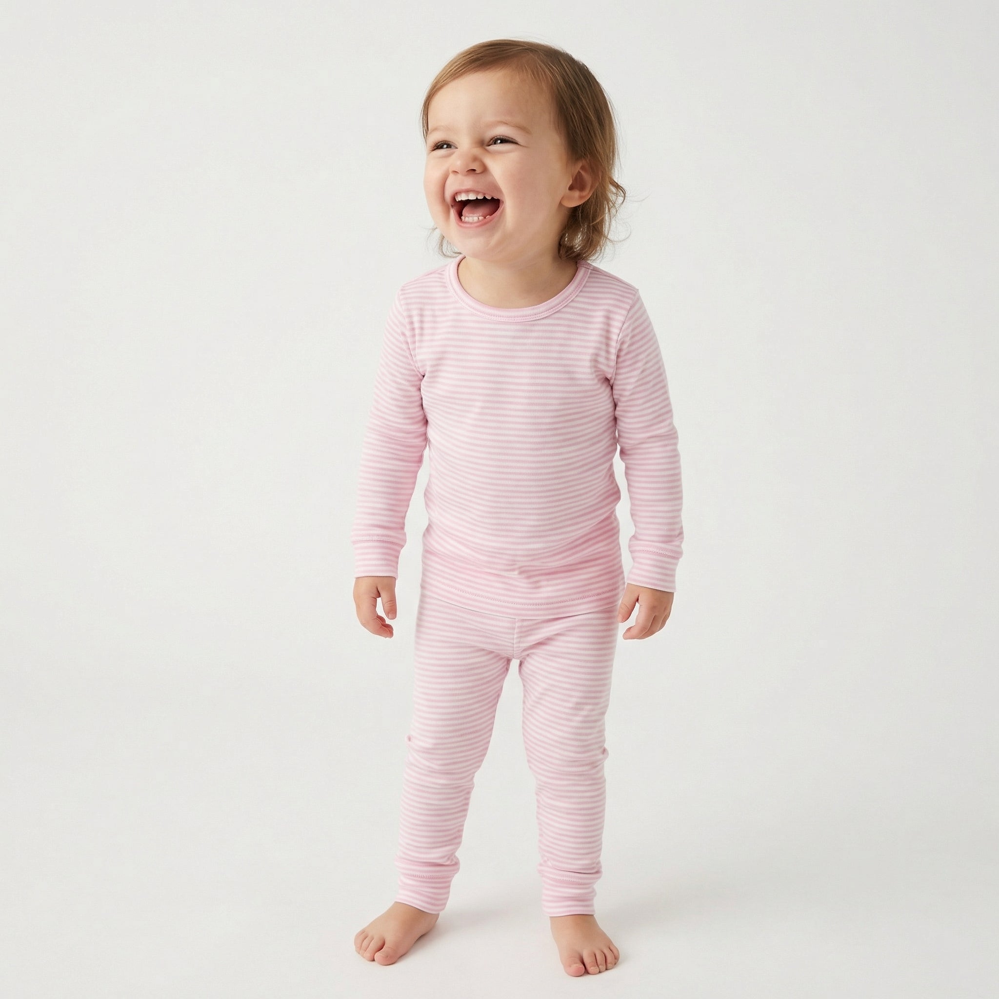 Best soft bamboo toddler pajamas in pink and white stripes for active kids and restful sleep
