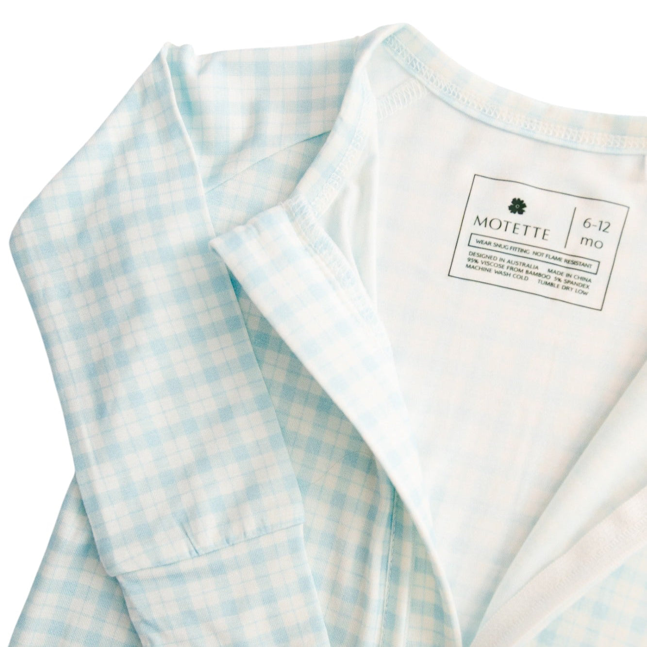 blue checkered zipper romper in bamboo fabric highlighting double zipper feature