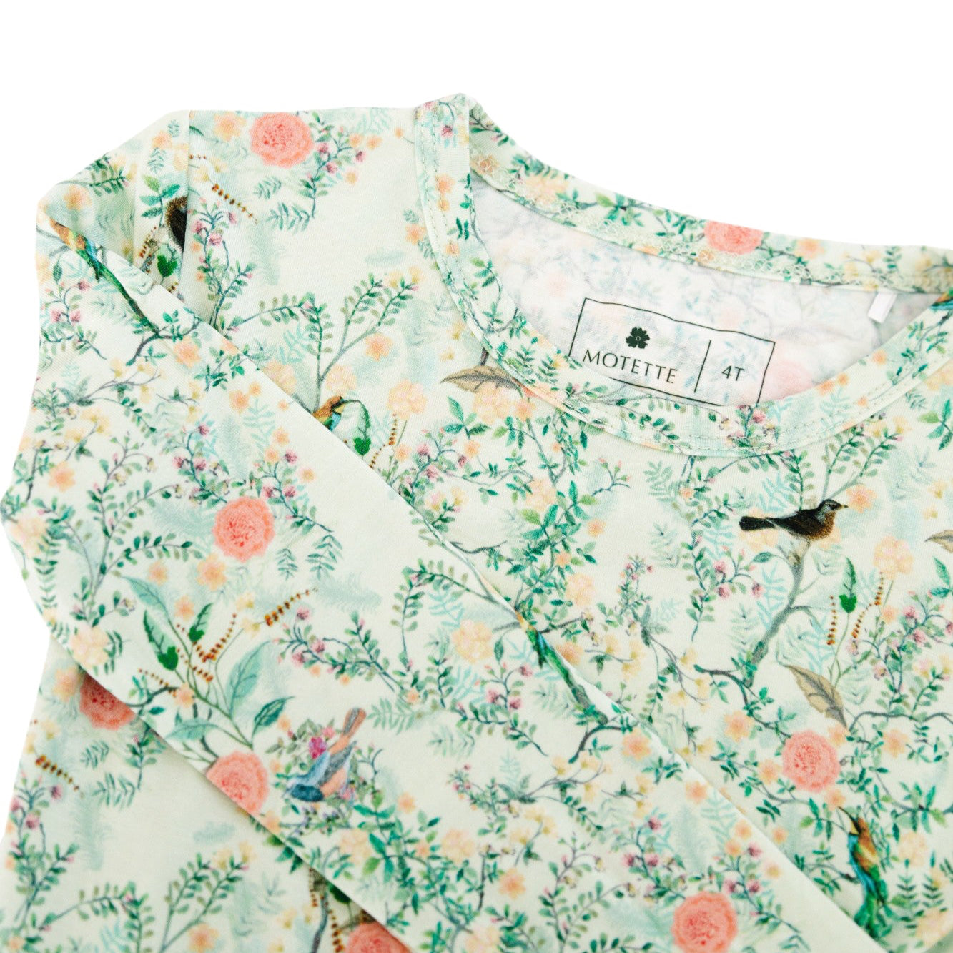Close-up of green floral toddler pajama set, highlighting soft bamboo fabric and delicate floral print.