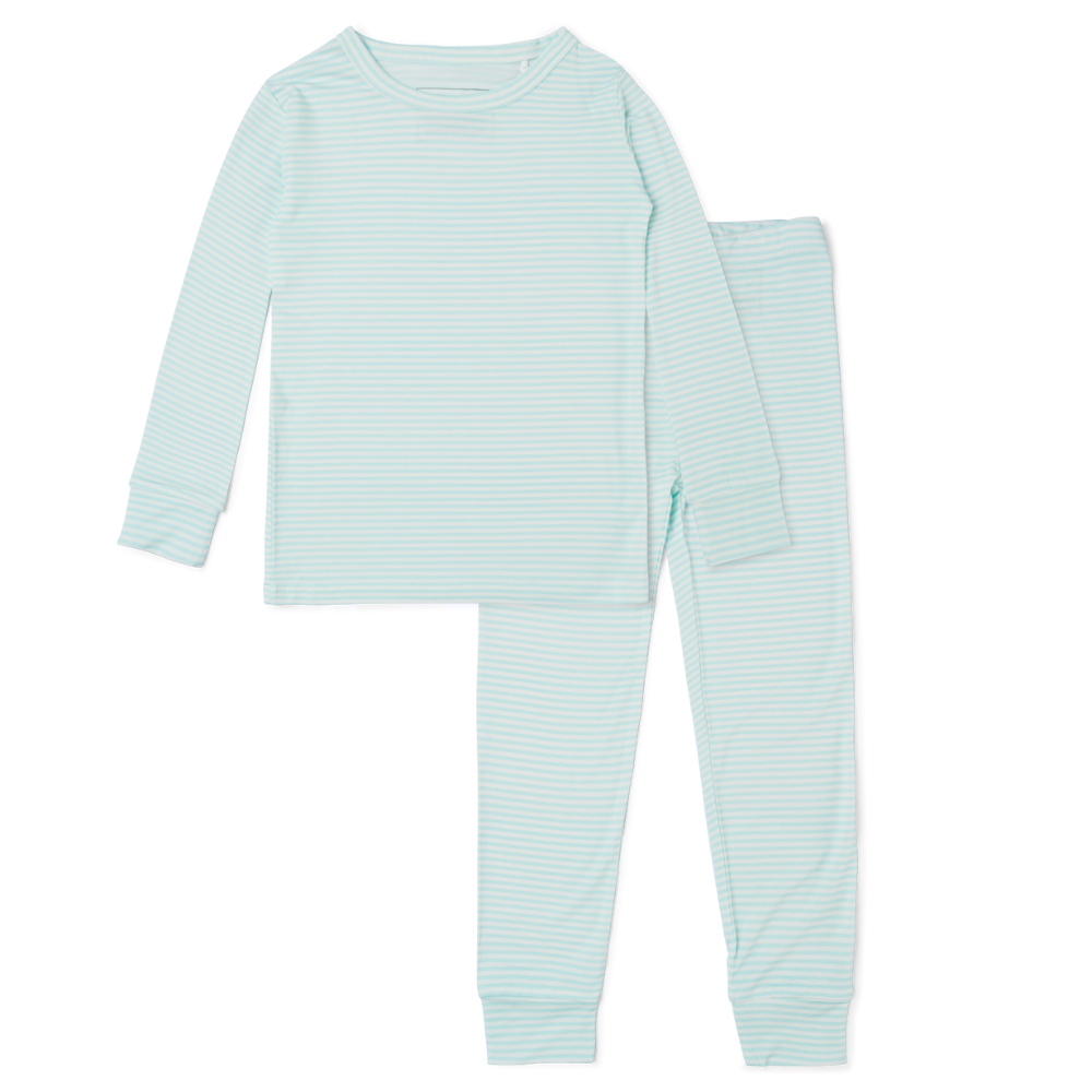 Flat lay of Cloud Stripe blue and white striped two-piece bamboo toddler pajama set with long pants


