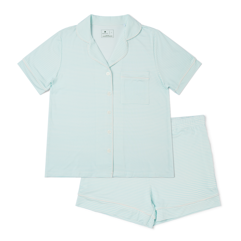 Flat lay Cloud Stripe short sleeve bamboo women's pajama set with button-up top and matching shorts

